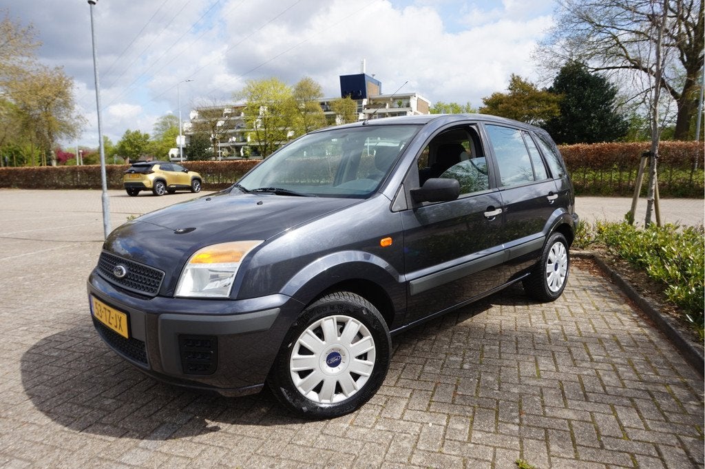Ford Fusion 1.4-16V Champion 97.000 km! (bj 2007), Auto's, Ford, Voorwielaandrijving, Gebruikt, Zwart, Metallic lak