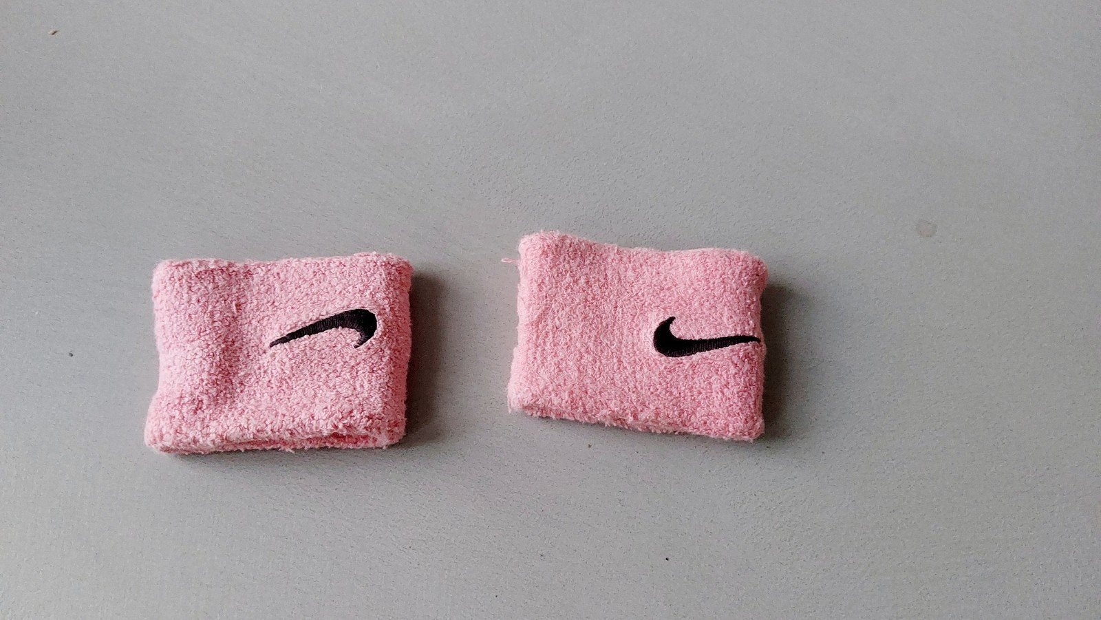 Roze Nike Classic Swoosh Zweetbandjes (2 stuks), Ophalen of Verzenden, Gebruikt