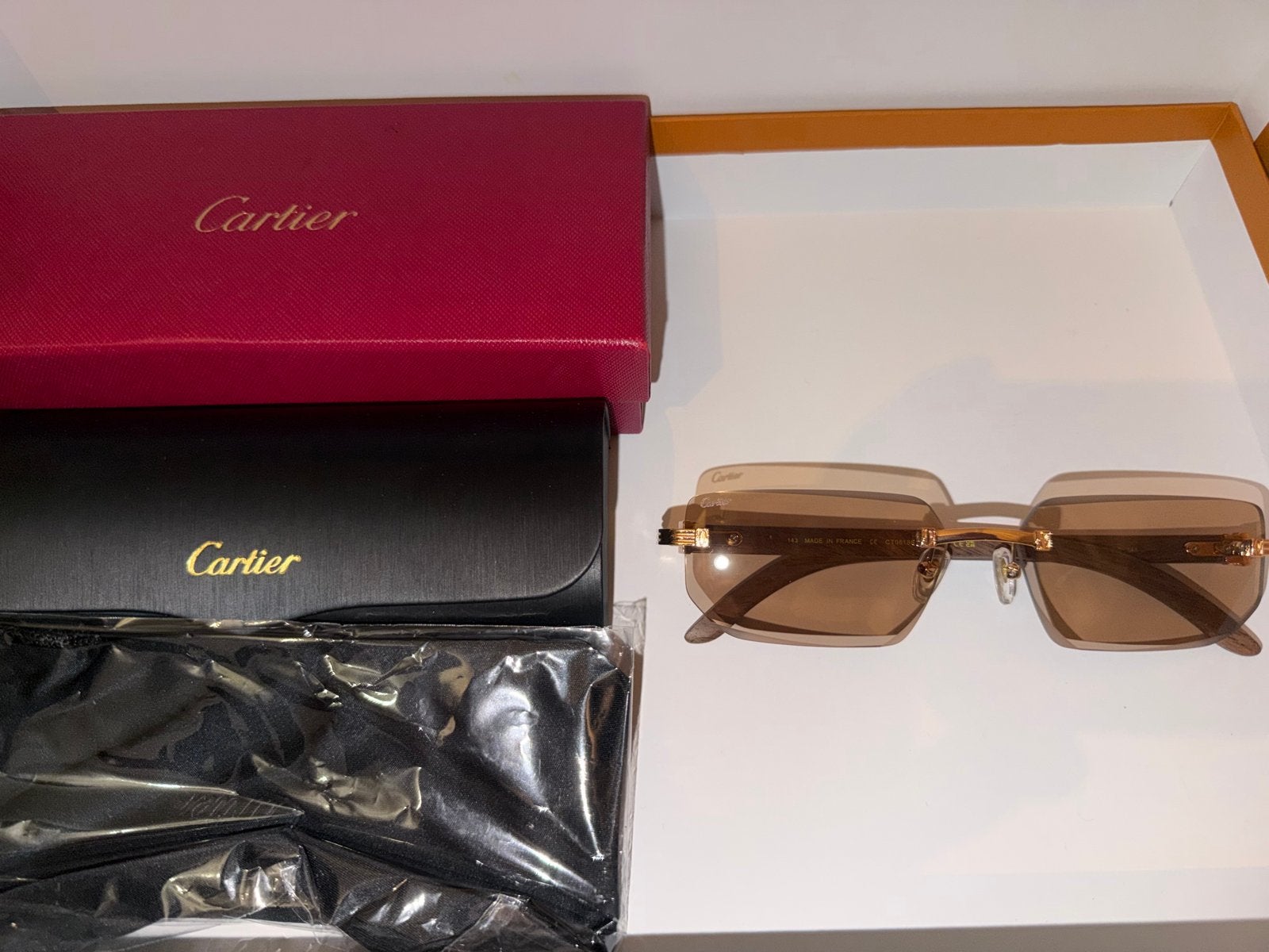 Cartier zonnebril met bruine glazen en houten poten, Overige merken, Zonnebril, Bruin, Ophalen of Verzenden