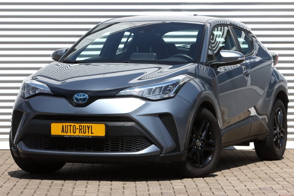 Toyota C-HR 1.8 Hybrid Active Navi / Camera / CarPlay, Dealer onderhouden, Stof, Gebruikt, Zwart