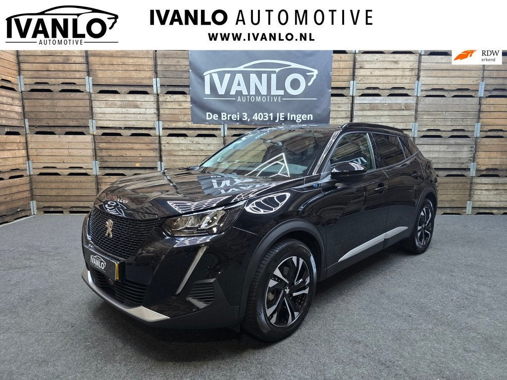 Peugeot E-2008 EV Allure Pack 50 kWh Carplay PDC LED Cruise, Auto's, 330 km, Gebruikt, Zwart, Zwart