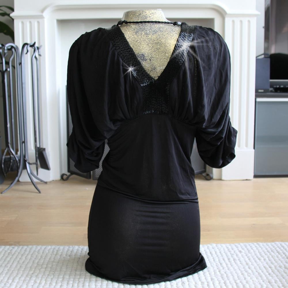 Zeer Mooie Super Star Glitter Tuniek (XS) € 25,-, Super Star, Zwart, Ophalen of Verzenden, Zo goed als nieuw