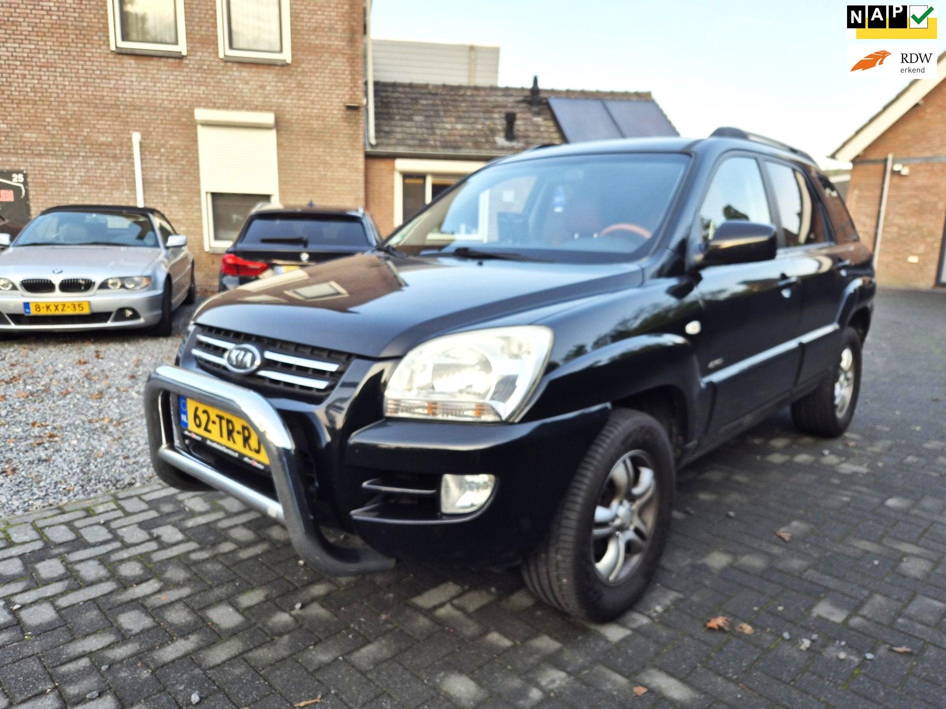 Kia Sportage 2.7 V6 M-bition 4WD Automaat Navi Clima Cruise, Auto's, Automaat, Gebruikt, Zwart, Vierwielaandrijving