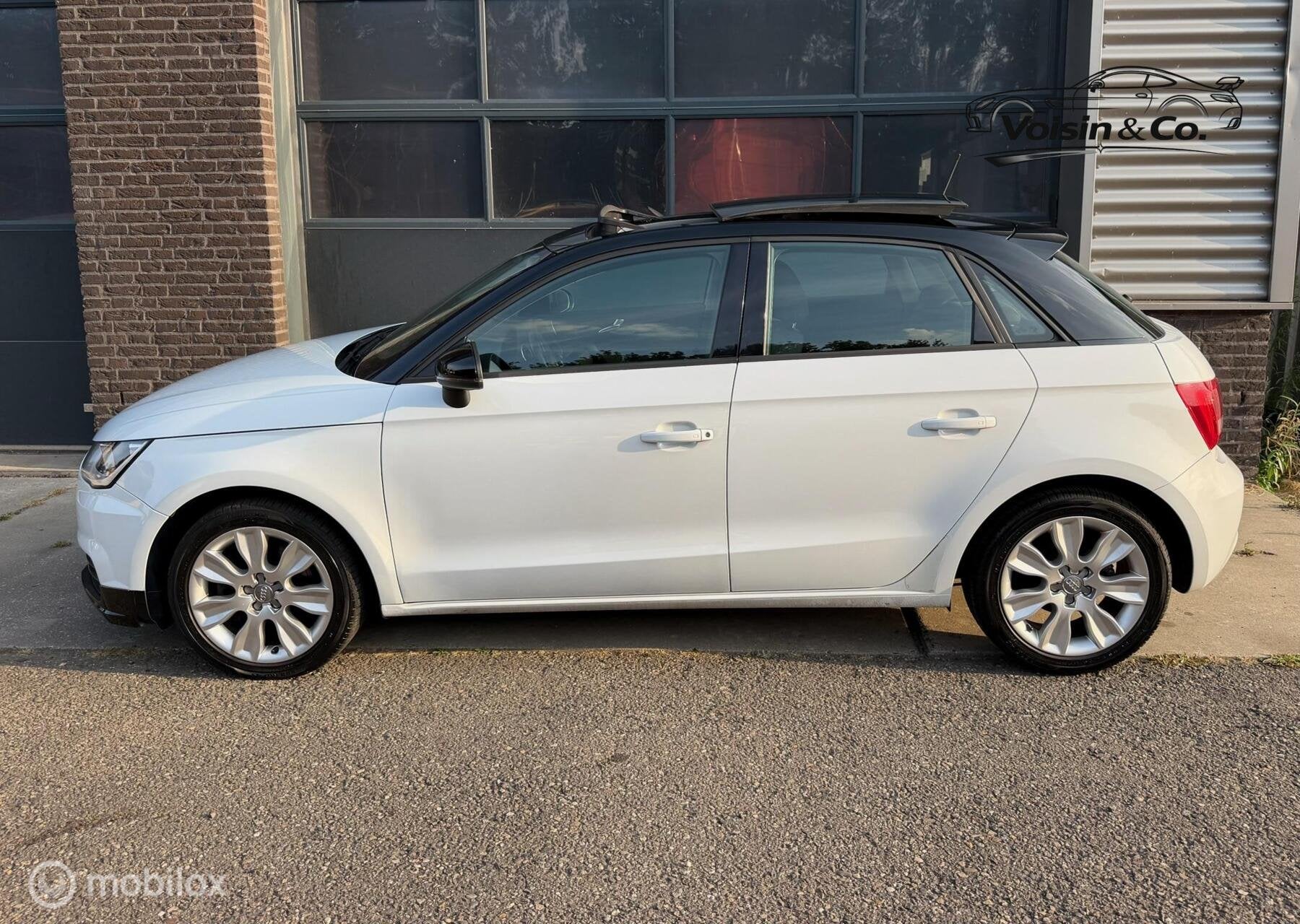 Audi A1 Sportback 1.4 TFSI Panoramadak Facelift PDC Stoelver, Voorwielaandrijving, Euro 5, Stof, Zwart