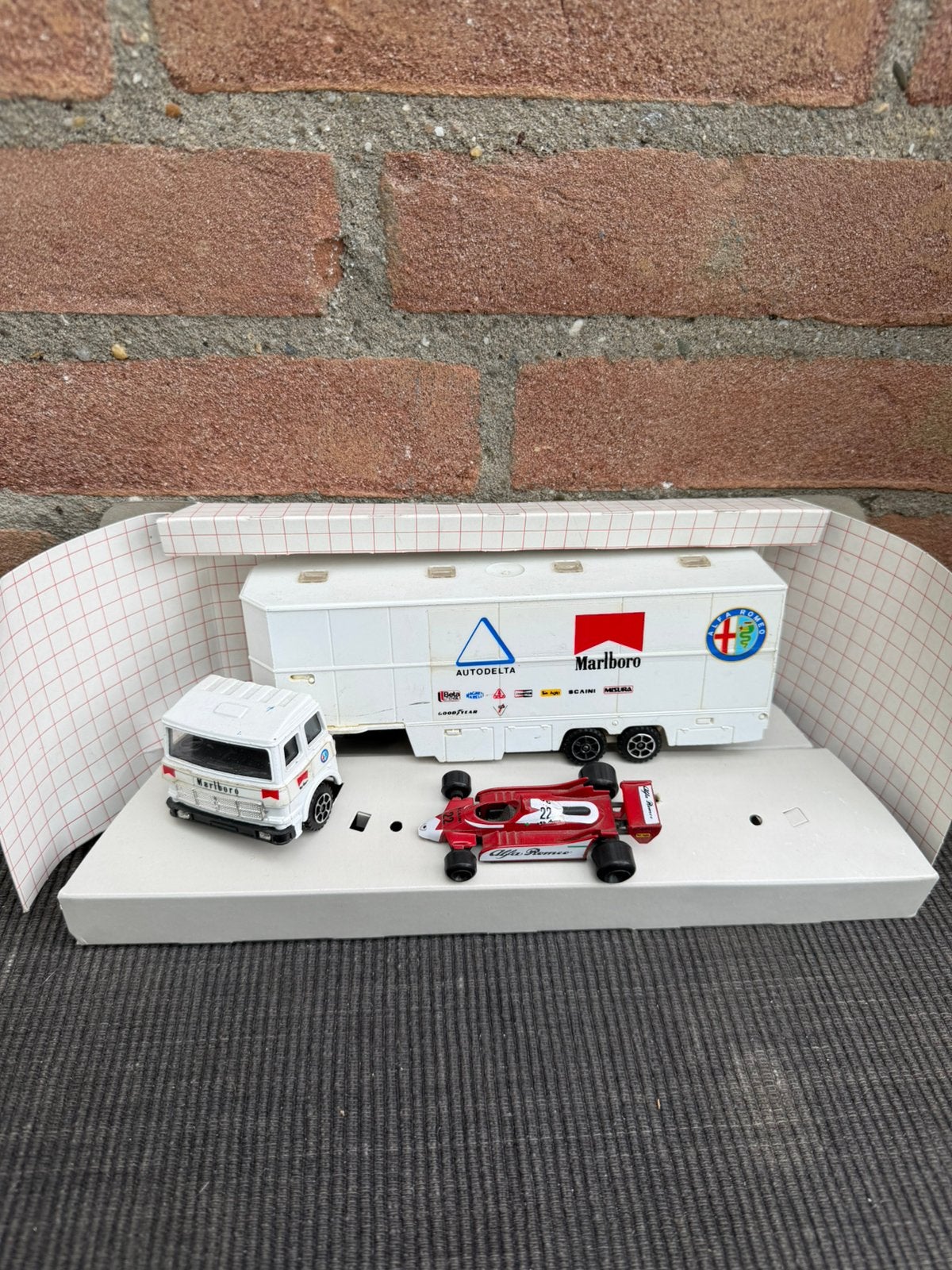 Polistil Alfa Romeo één X F1 + racetransporter, Ophalen of Verzenden, Gebruikt, Auto