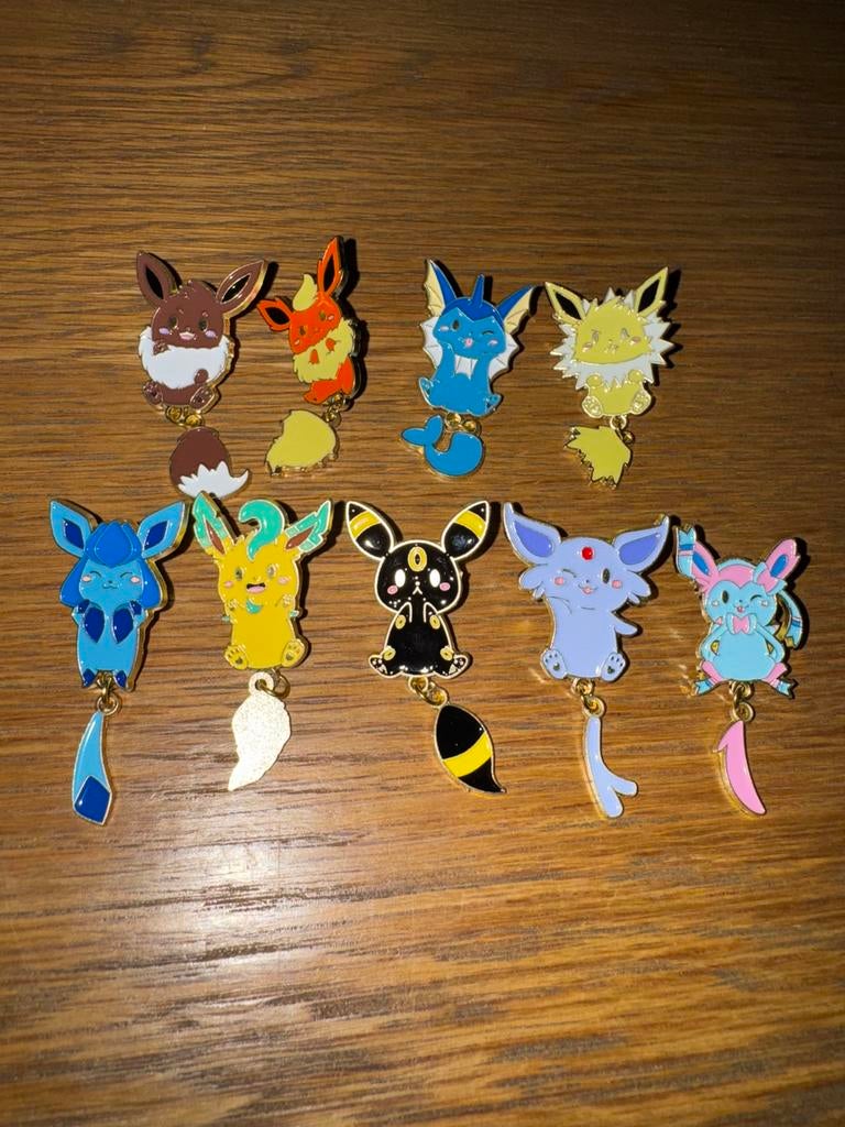 9 Pokemon pins Eevee en de evoluties, Ophalen of Verzenden, Nieuw, Speldje of Pin
