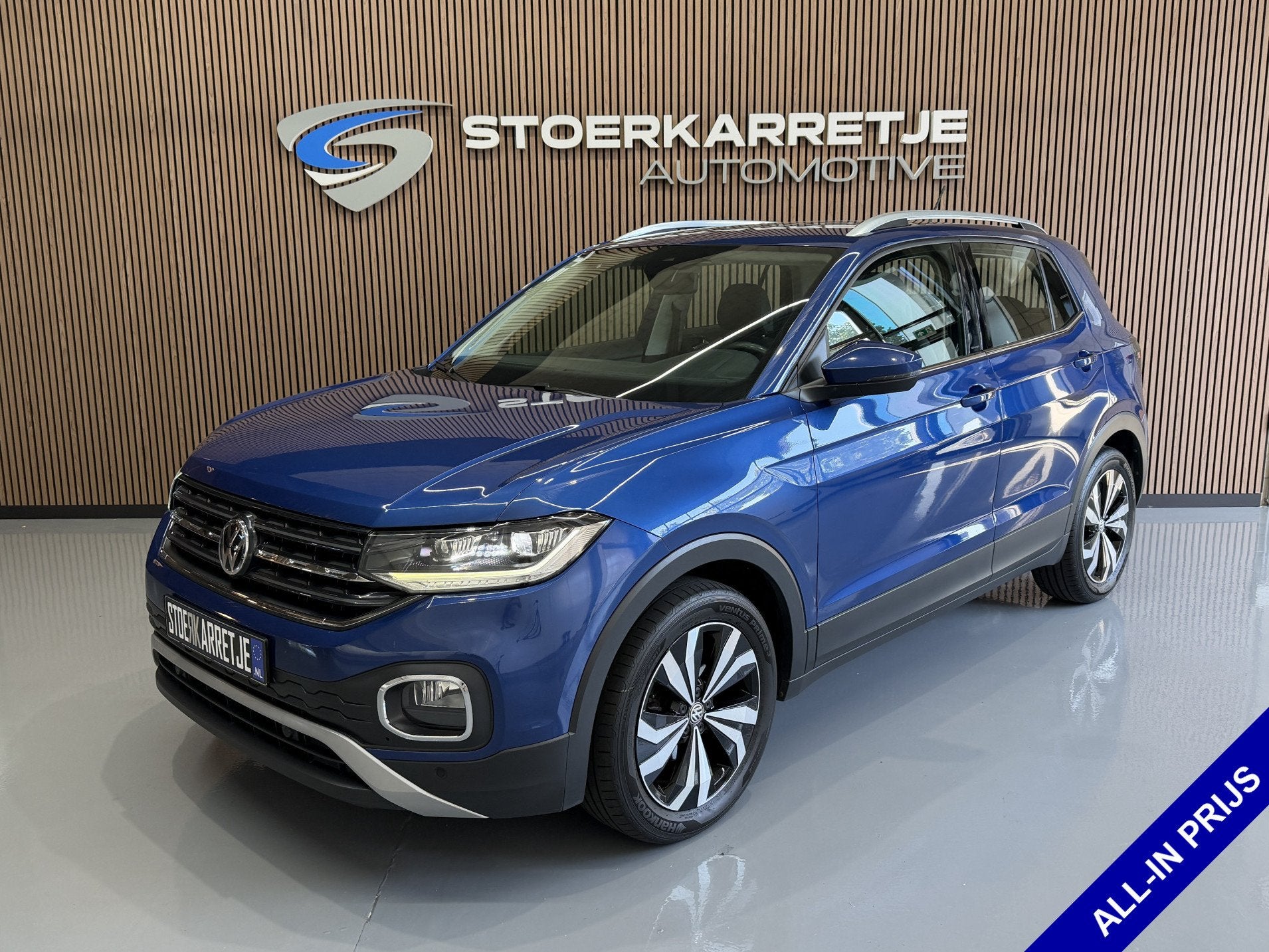 Volkswagen T-Cross 1.0 TSI 115pk DSG Style | Navi | Carplay, Auto's, Dealer onderhouden, Gebruikt, Zwart, Blauw
