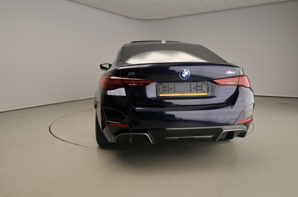 BMW i4 Grand Coupe M60 | M-Sportpakket | Leder | HUD | Activ, Auto's, BMW, Zwart, Met garantie (alle), Blauw, 601 pk
