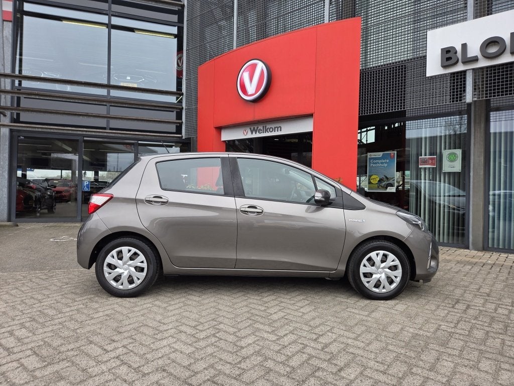 Toyota Yaris 1.5 Hybrid A/T Active | Climate | Camera | Crui, Auto's, 12 maanden, 4 cilinders, Bedrijf, Hybride Elektrisch/Benzine