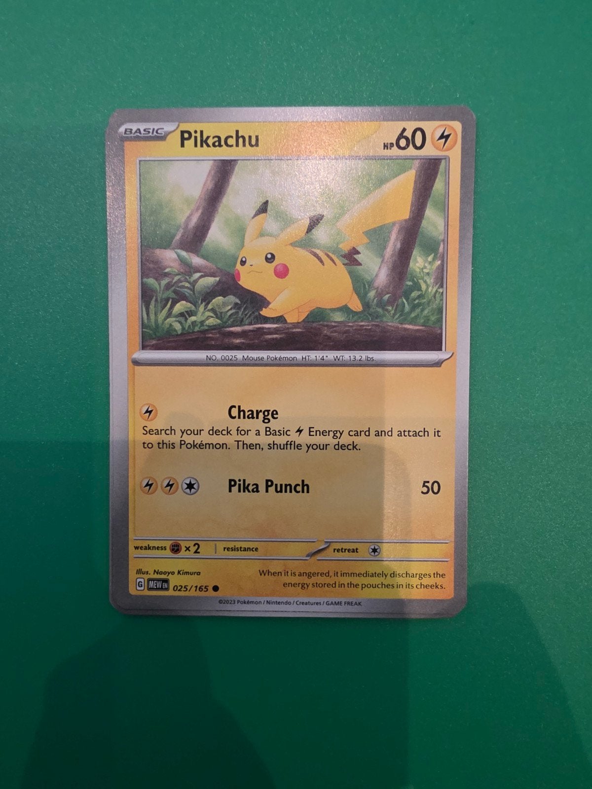 Pikachu 025/165, Ophalen of Verzenden, Zo goed als nieuw