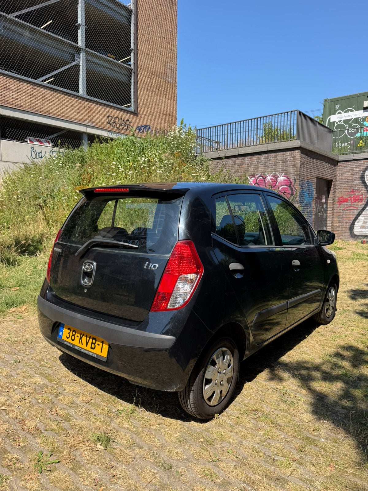 Hyundai i10 1.1 I 5DR 2010 Zwart (AIRCO), Auto's, Voorwielaandrijving, Stof, 4 cilinders, 400 kg