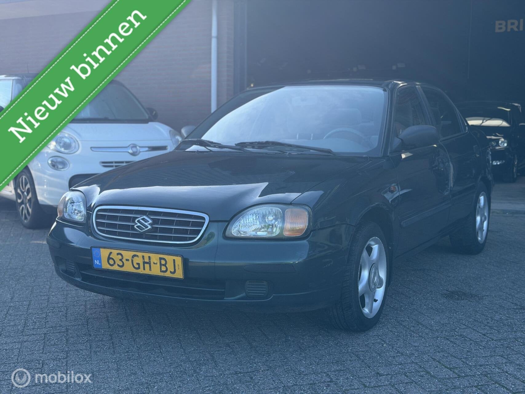 Suzuki Baleno 1.6 GLX AIRCO|AUTOMAAT|APK|EXPORT/HANDEL!, Auto's, Stof, 4 cilinders, 965 kg, Origineel Nederlands