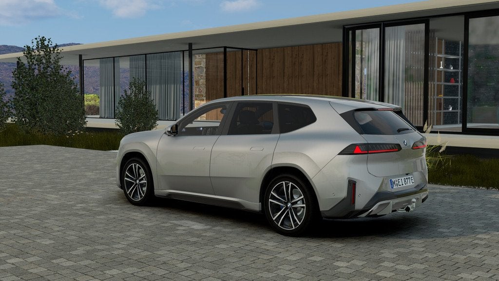 BMW iX3 40 eDrive M Sport / Panoramadak / Trekhaak / Stuurve, Auto's, BMW, Automaat, Achterwielaandrijving, Zwart, Leder