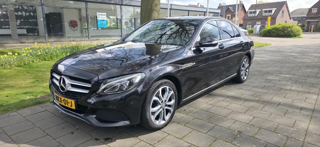 Mercedes-Benz C-Klasse C180 1.6 115KW Aut7/ 2015 Zwart, Auto's, Automaat, 1800 kg, Zwart, 1595 cc