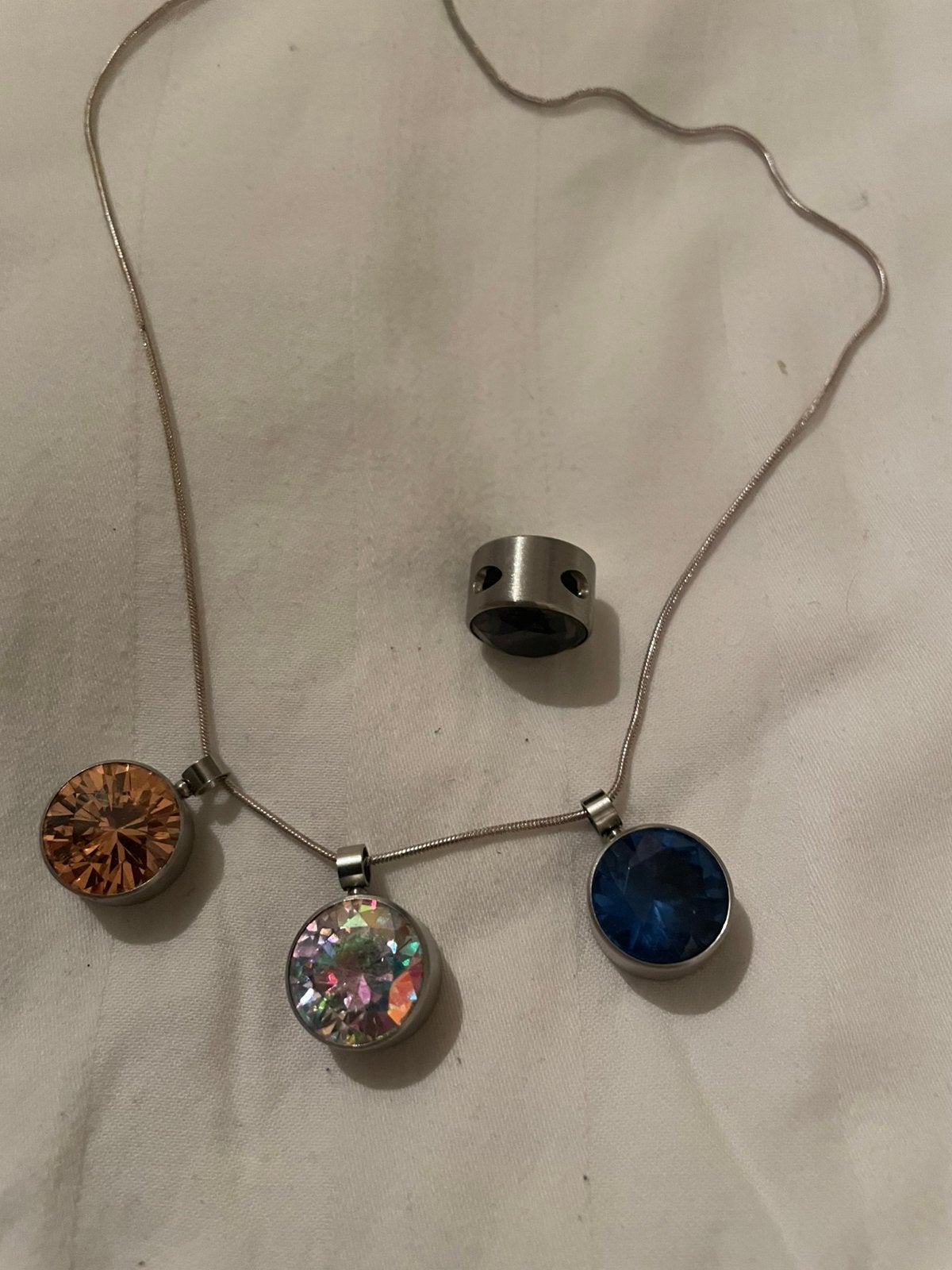 Melano hangers en oorbellen., Met kristal, Overige materialen, Blauw, Ophalen of Verzenden