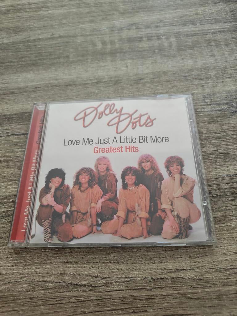 Dolly Dots - Love Me Just A Little Bit More Greatest Hits CD, Cd's en Dvd's, Cd's | Pop, Ophalen of Verzenden, 1980 - 1989, Zo goed als nieuw