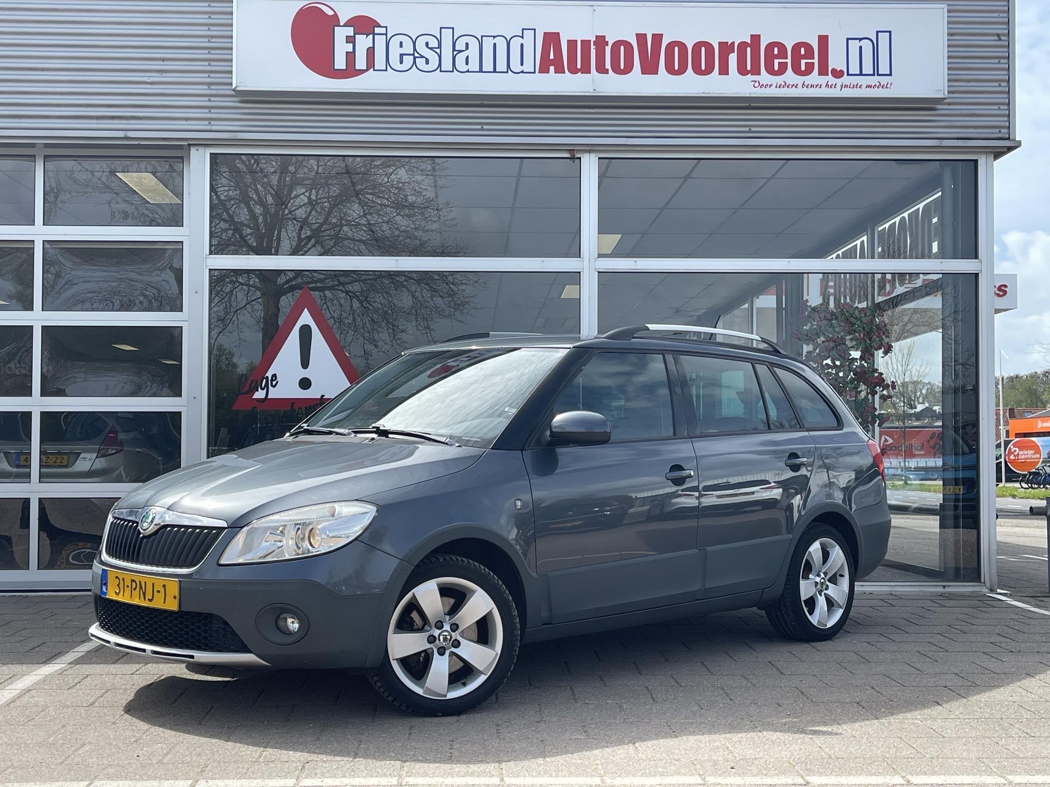 Skoda Fabia Combi 1.2 TSI Scout /Cruise/Navi/Trekhaak/Onderh, Voorwielaandrijving, Euro 5, 4 cilinders, Met garantie (alle)
