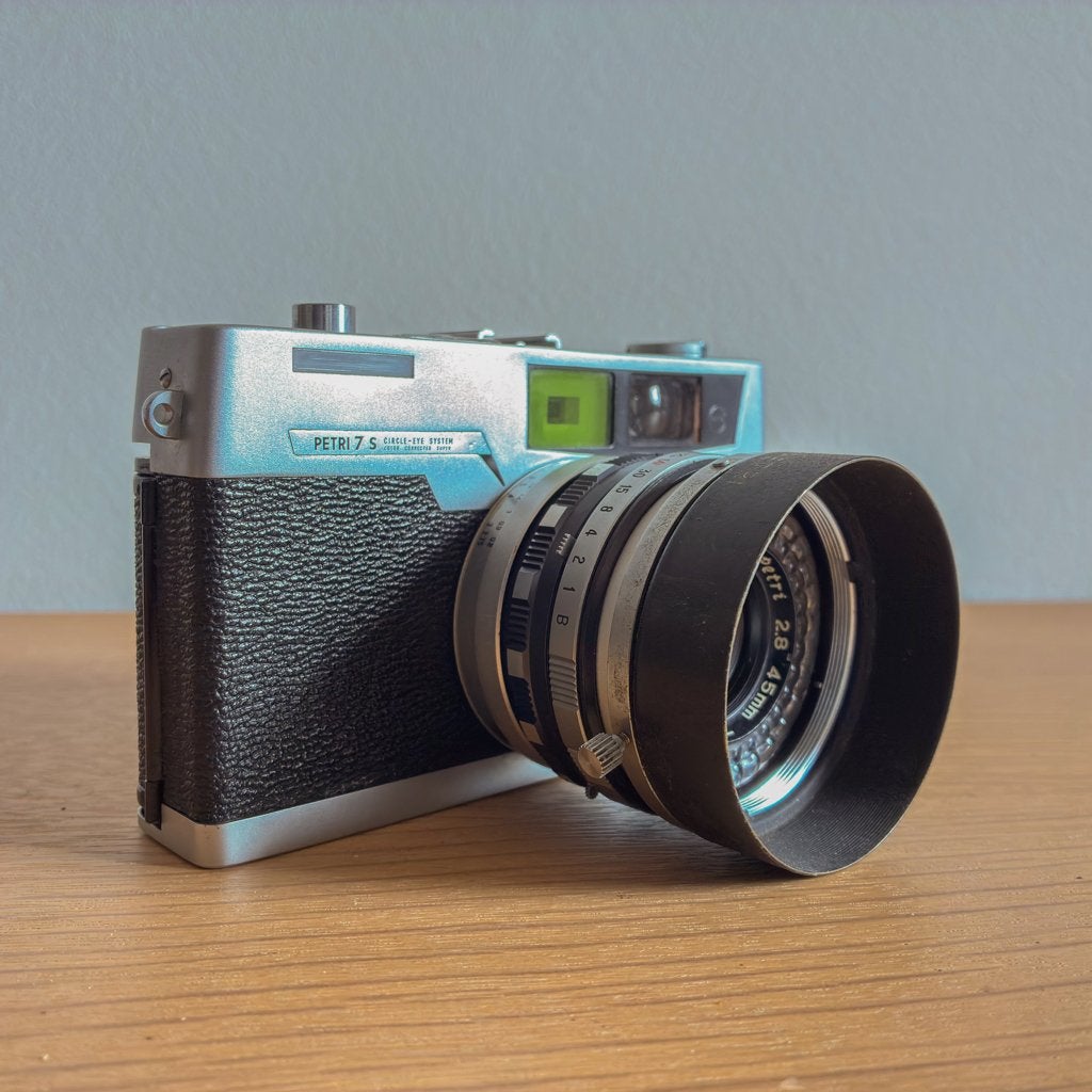 Analoge camera Petri 7s met zonnekap, Ophalen of Verzenden, 1960 tot 1980, Fototoestel