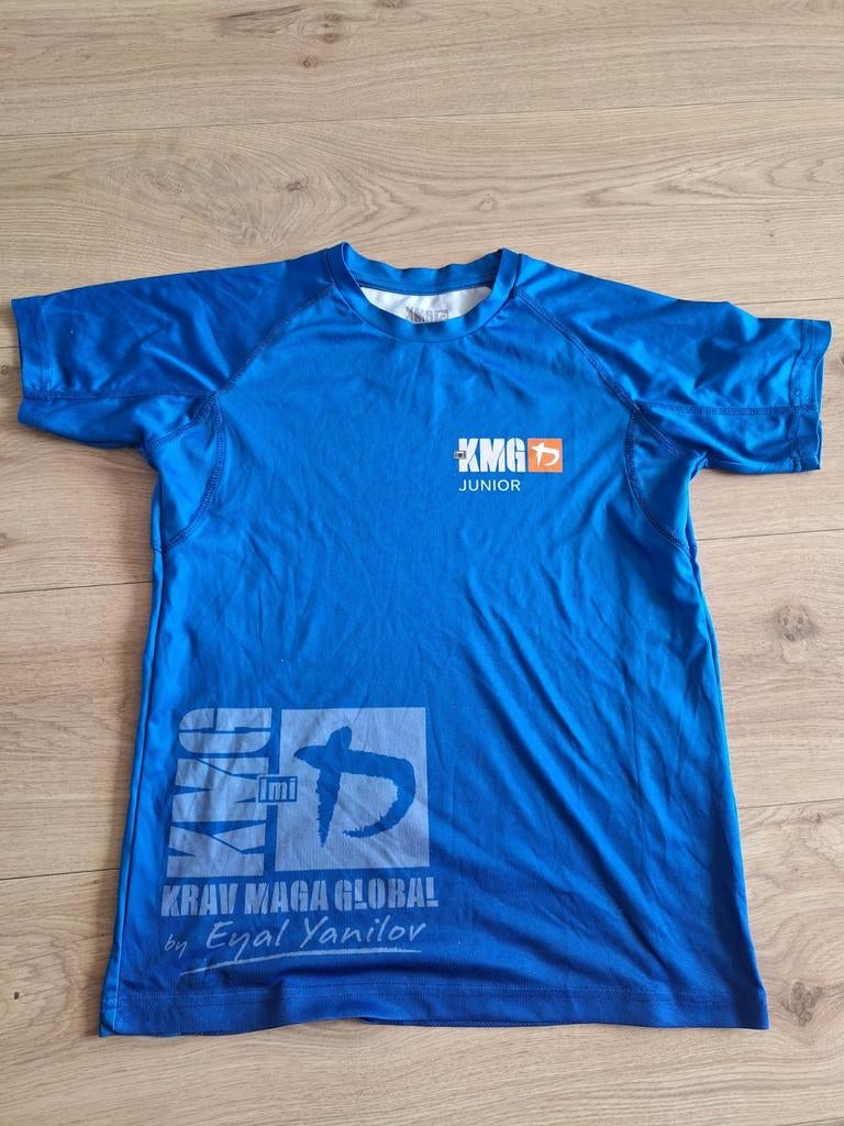 KMG Krav Maga Global Junior T-shirt Blauw Maat 152/164, Ophalen of Verzenden, Gebruikt, KMG Krav Maga Global, Jongen of Meisje