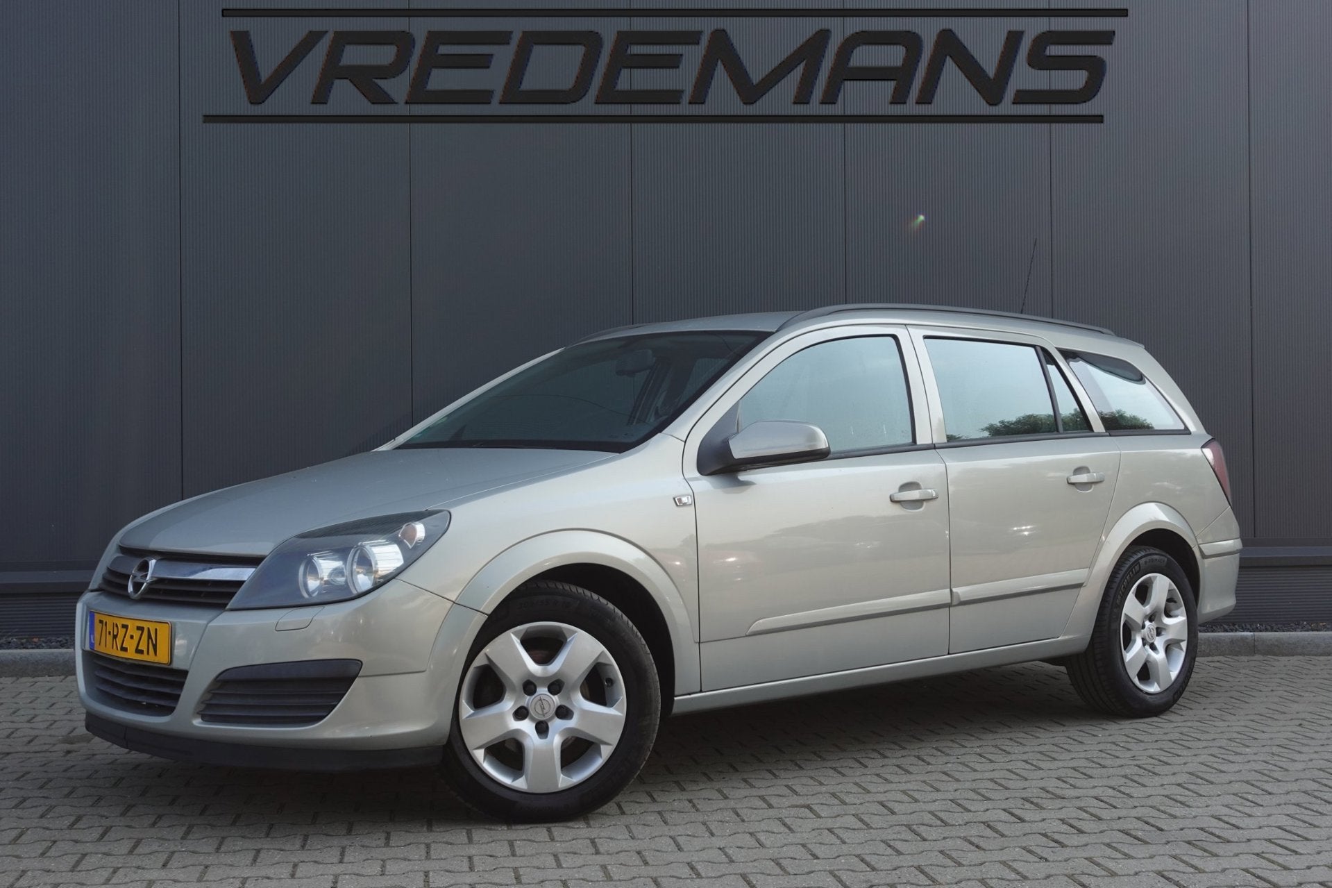 Opel Astra Wagon 1.6 Edition, Auto's, Gebruikt, 4 cilinders, Origineel Nederlands, Grijs