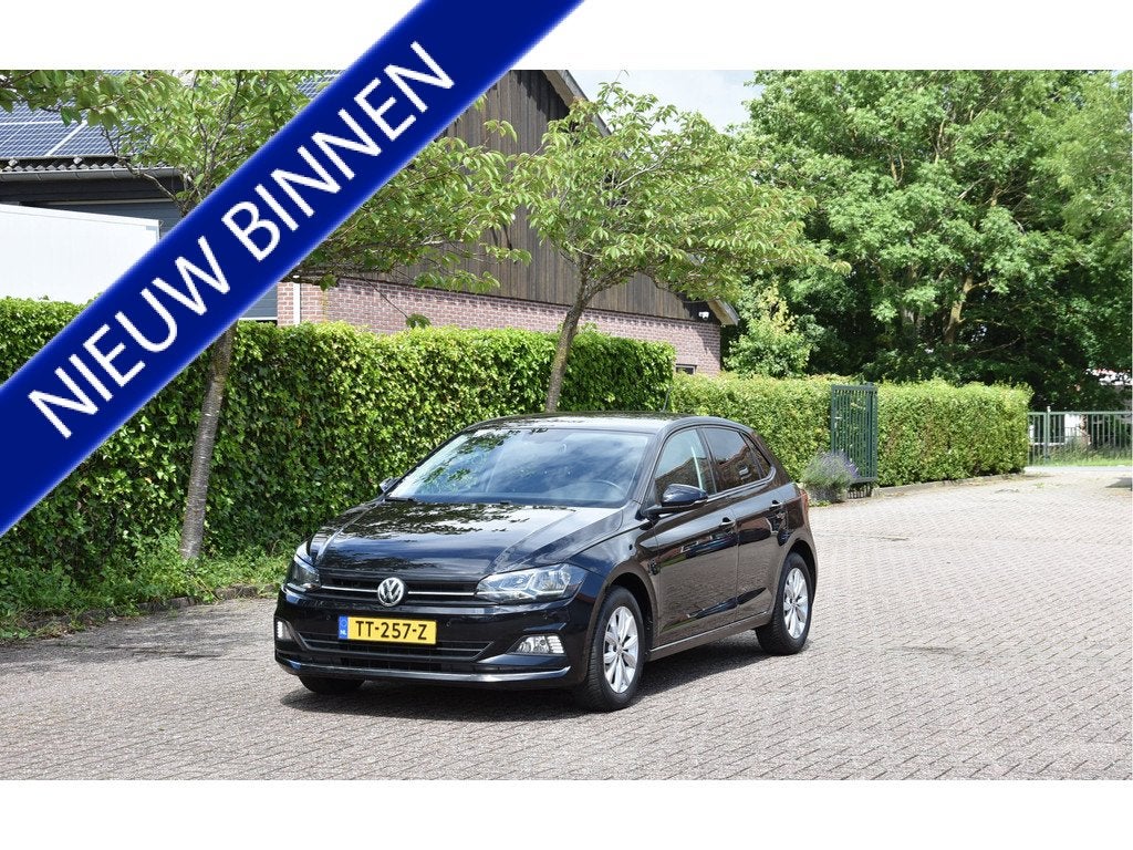 Volkswagen Polo 1.0 TSI 96 PK Highline Garantie ECC stoelver, Stof, 1045 kg, Met garantie (alle), Zwart