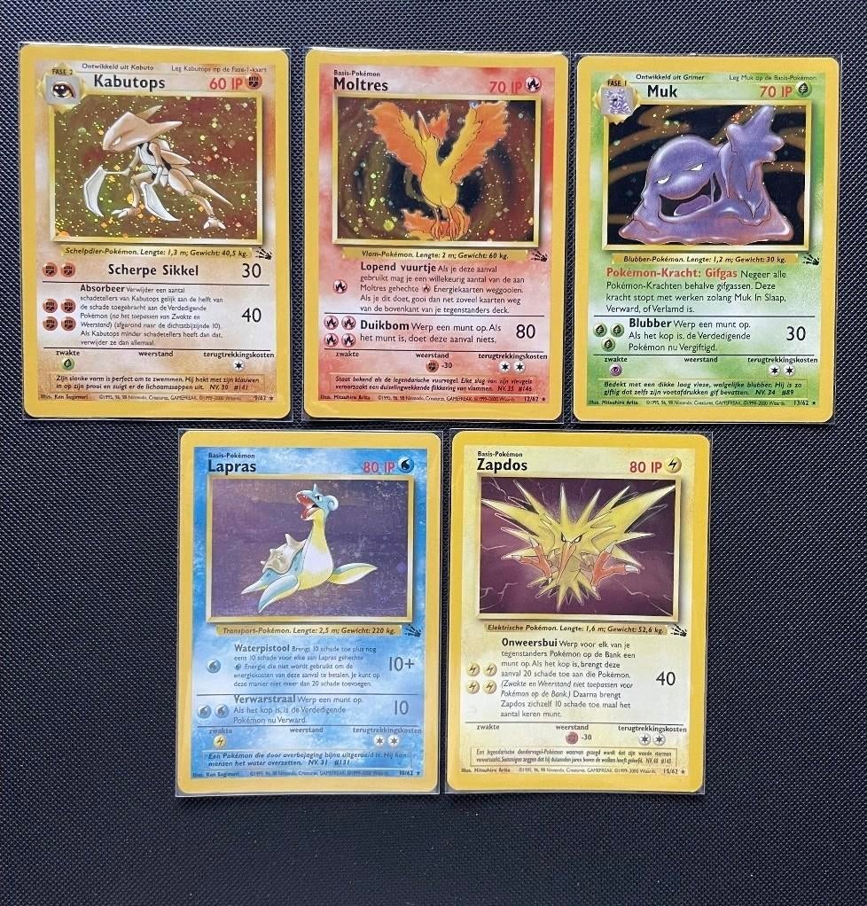 GEZOCHT: Nederlandse fossil Holo Unlimited Pokémon kaarten, Ophalen of Verzenden, Gebruikt, Meerdere kaarten, Foil