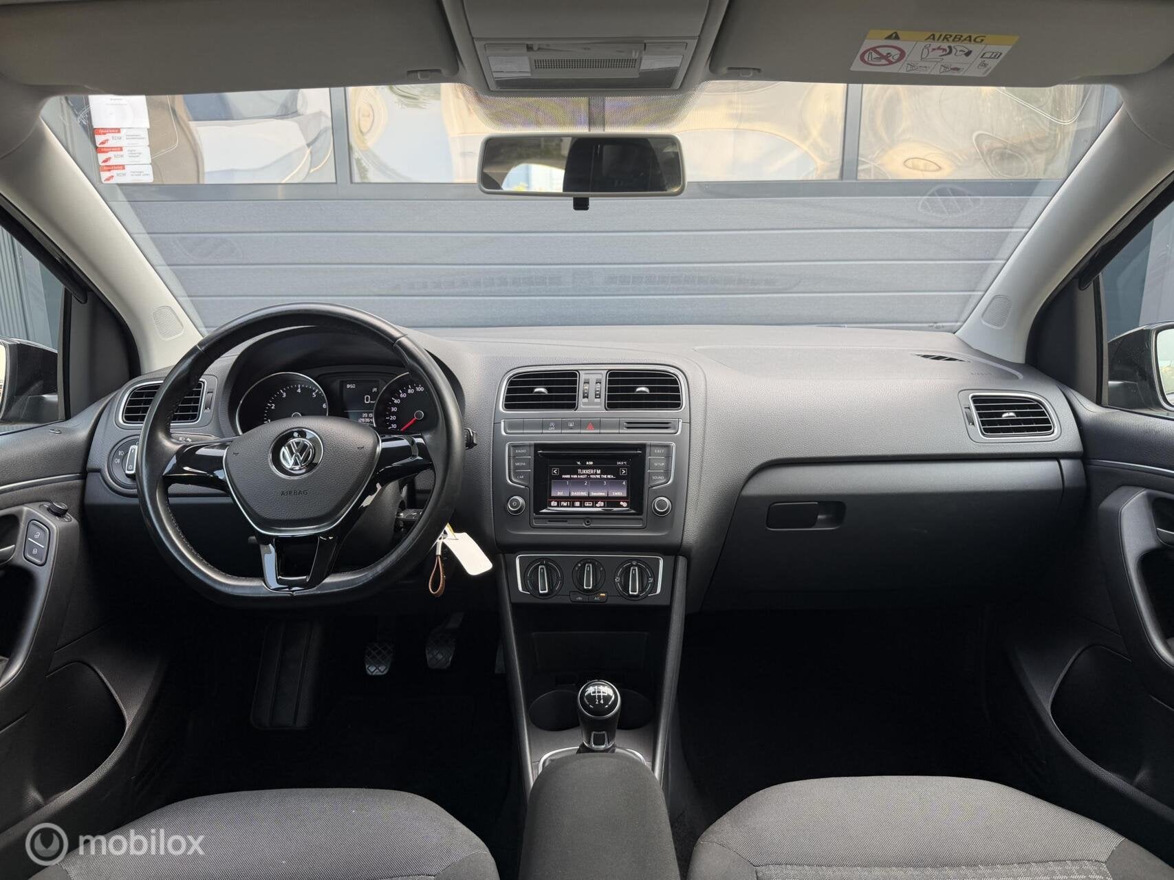 Volkswagen Polo 1.2 TSI Comfortline | Airco | Zuinig, Stof, Gebruikt, 4 cilinders, Zwart
