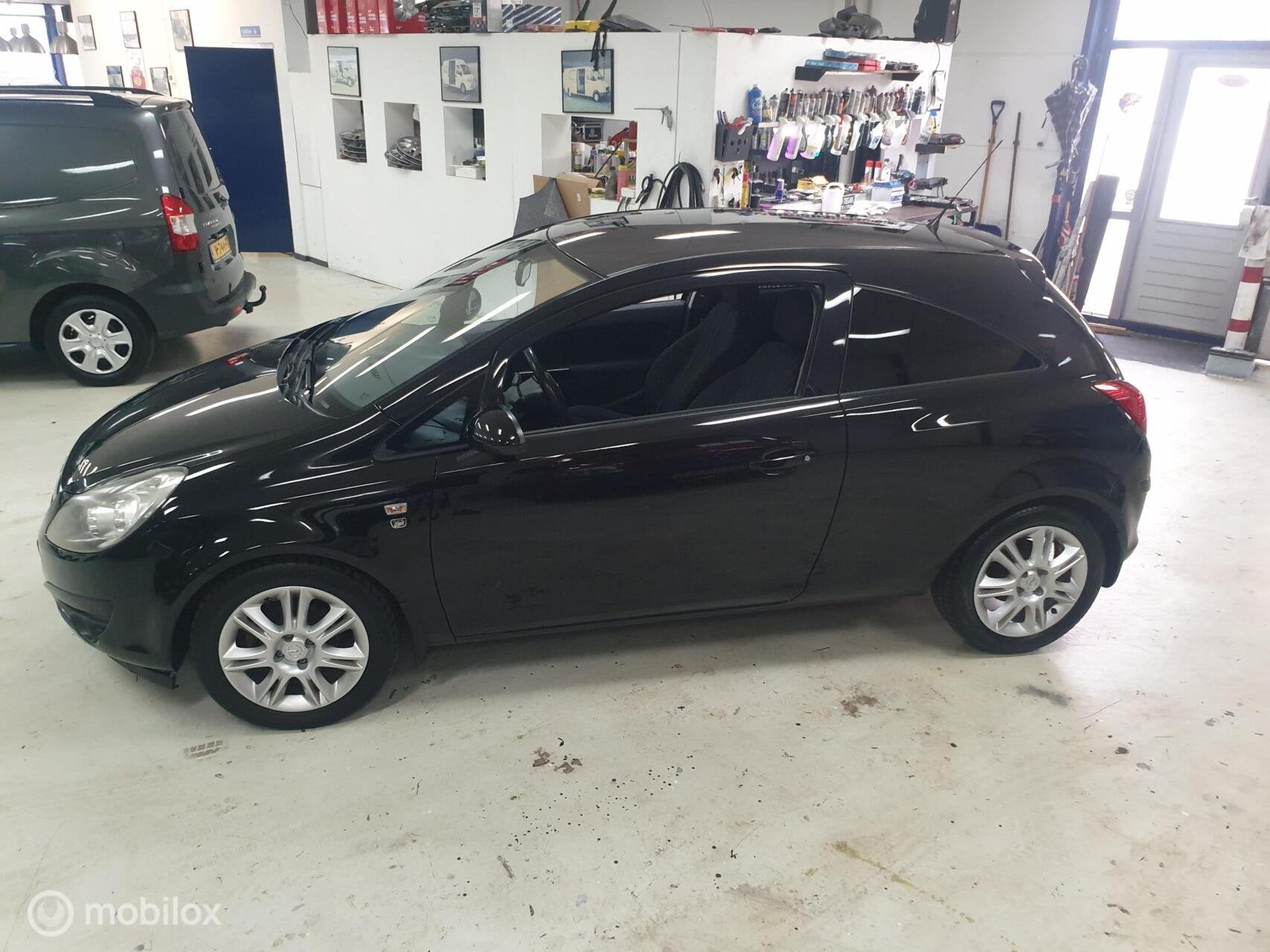 Opel Corsa 1.2-16V Cosmo 2010 Airco! 86 PK, Auto's, Voorwielaandrijving, Euro 5, 1229 cc, Zwart