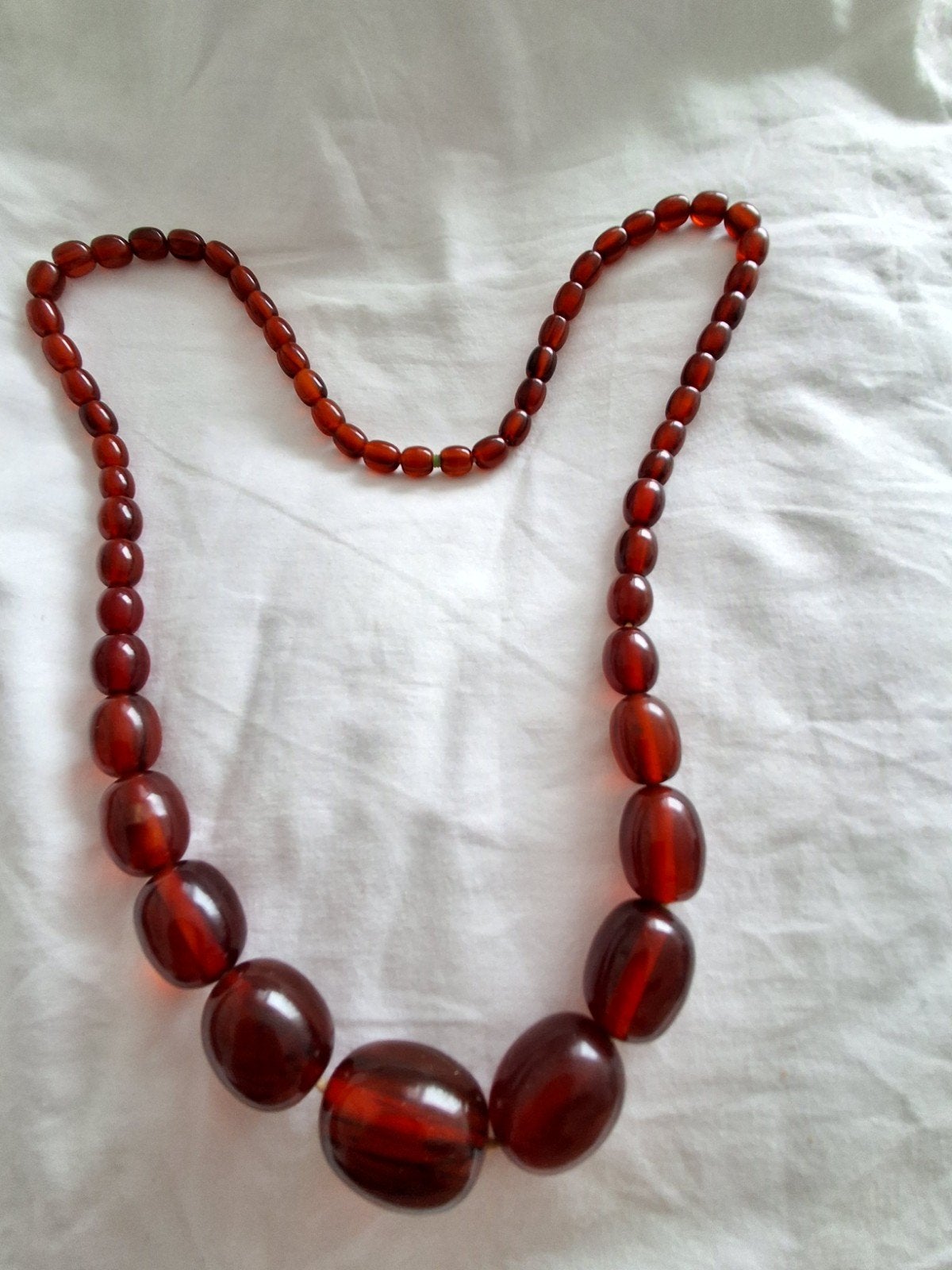 Bakeliet ketting 90 gram en 70 cm, Ophalen of Verzenden, Overige materialen, Ketting