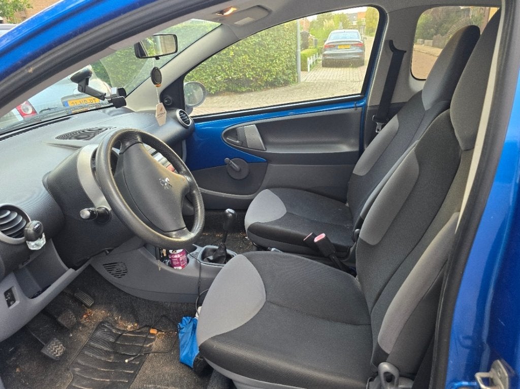 Peugeot 107 1.0 12V 3DR 2009 Blauw, Auto's, Voorwielaandrijving, Stof, 68 pk, Origineel Nederlands