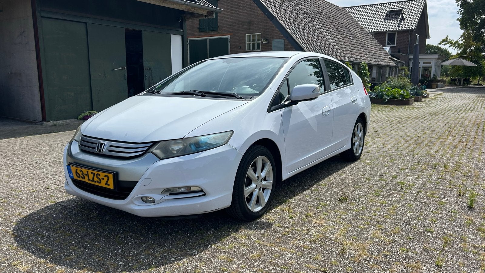 Honda Insight 1.3 Hybrid AUT 2010 Wit, Auto's, Honda, 4 cilinders, Wit, 22 km/l, Te koop