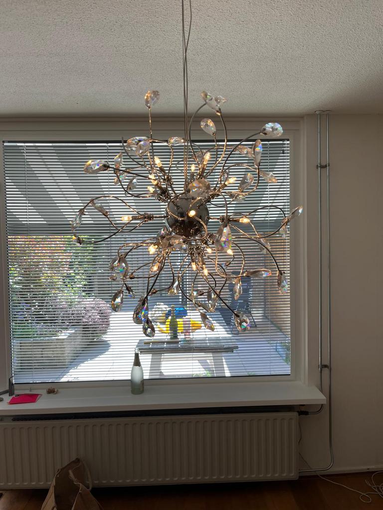 Lamp met kristallen, Ophalen