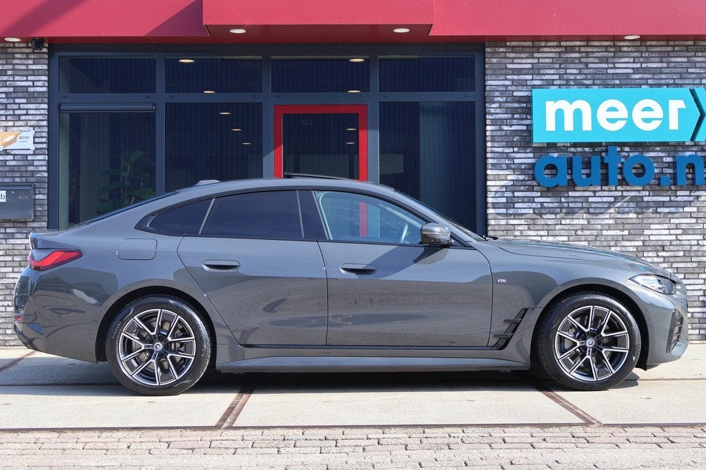 BMW I4 40 84 kWh High Executive M-SPORT l SOH 96,4% l H/K l, Auto's, BMW, Achterwielaandrijving, Gebruikt, 590 km, 340 pk