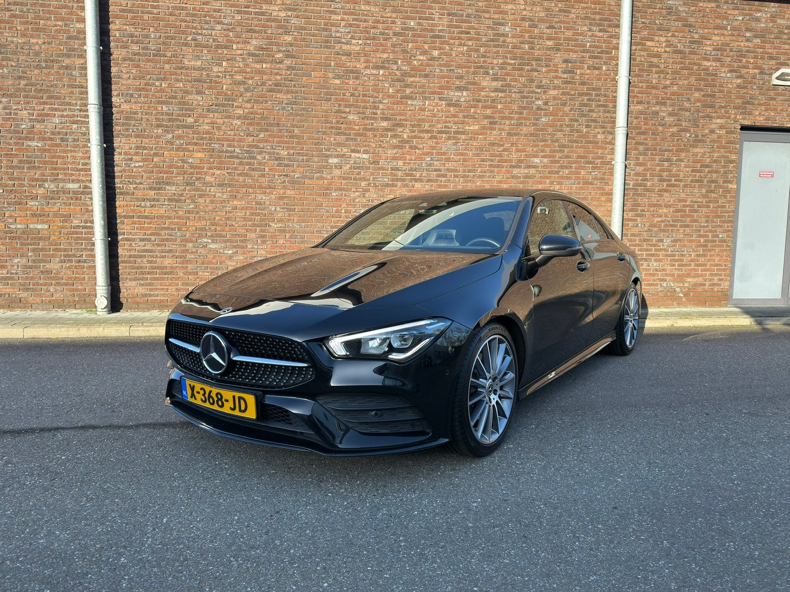 Mercedes-Benz CLA 200 163pk 7G-DCT 2019 Zwart - AMG - DEALER, Auto's, Leder, Bedrijf, 1600 kg, Sedan