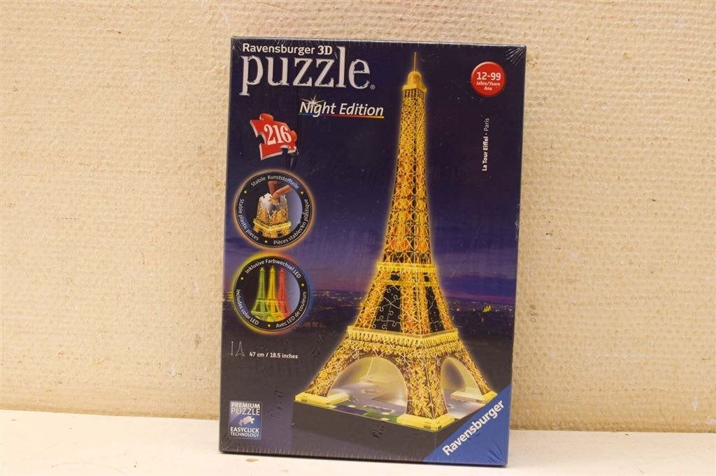 Ravensburger D puzzel night edition La Tour Eiffel 49493, Hobby en Vrije tijd, Ophalen of Verzenden, 500 t/m 1500 stukjes, Gebruikt