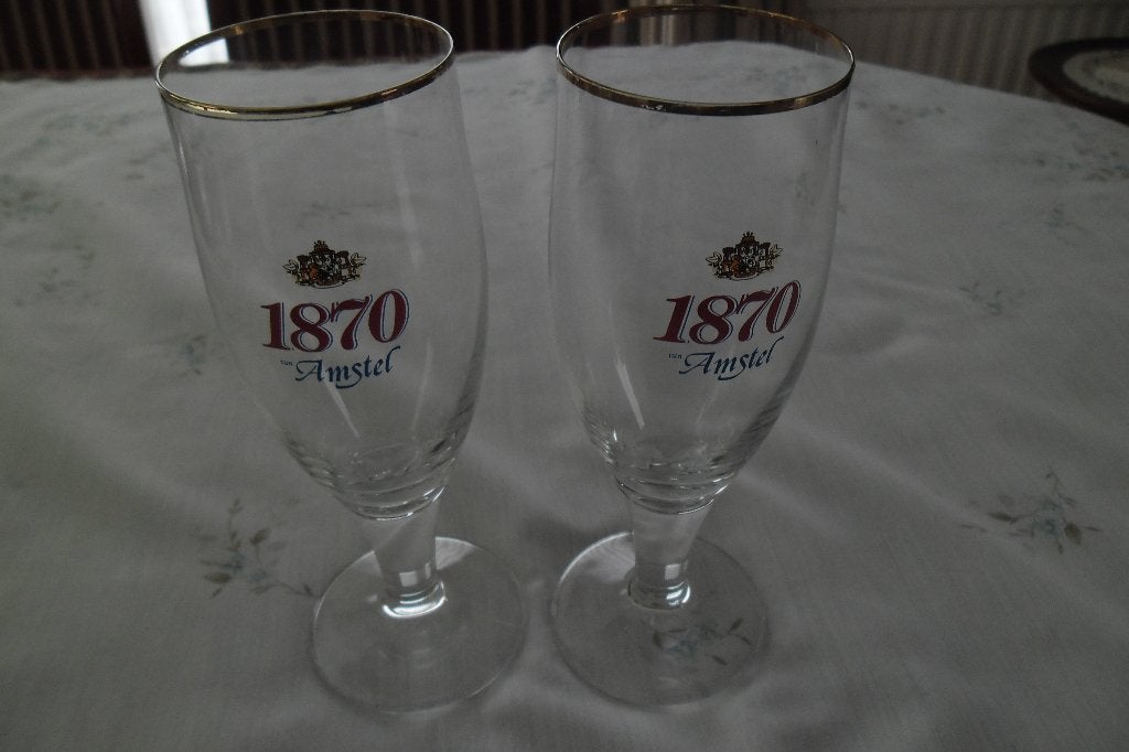 2 bierglazen Amstel, Ophalen of Verzenden, Zo goed als nieuw, Glas of Glazen, Amstel