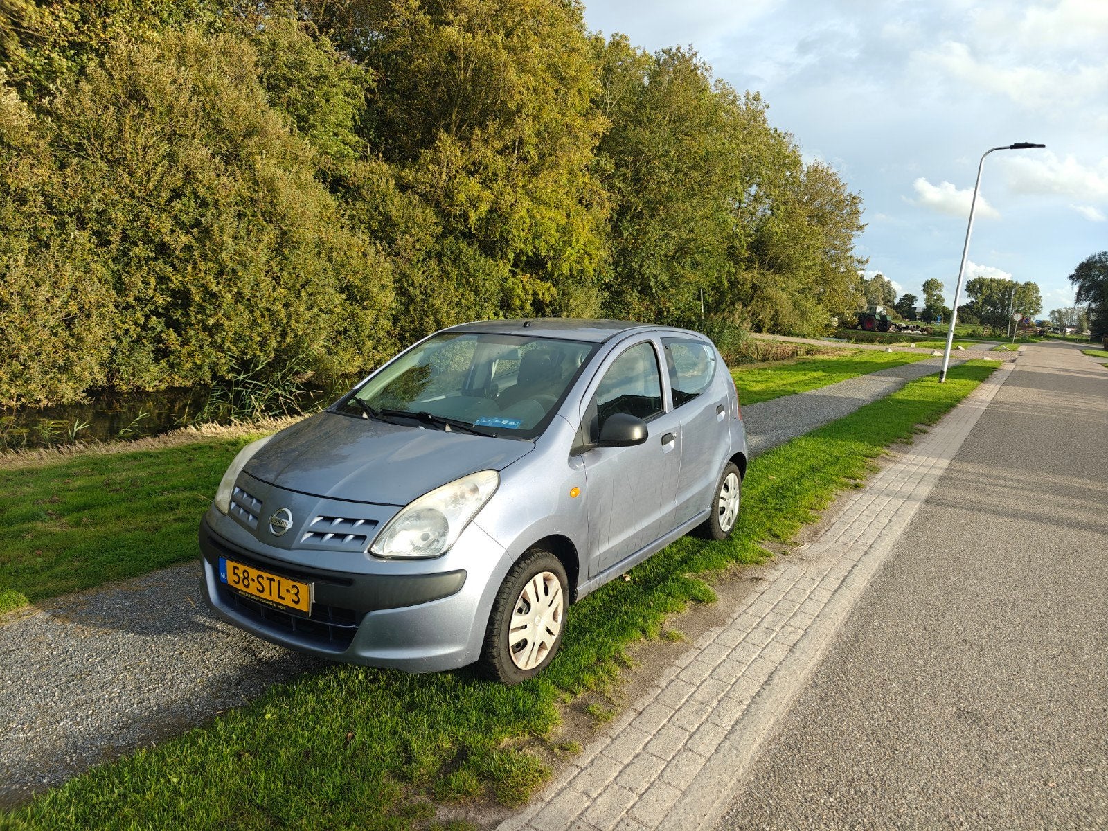 Nissan Pixo 1.0 50KW 5D 2011 Blauw 154.200KM, Auto's, Voorwielaandrijving, 200 kg, Origineel Nederlands, Bedrijf