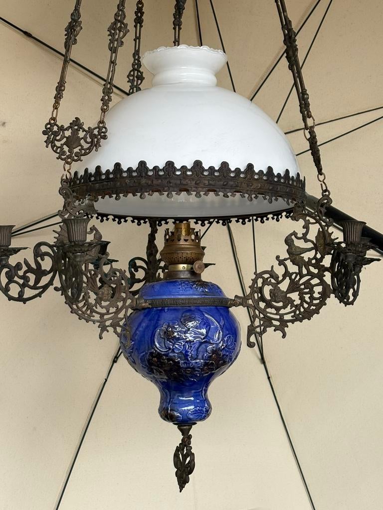 Antieke hangende olielamp, Ophalen