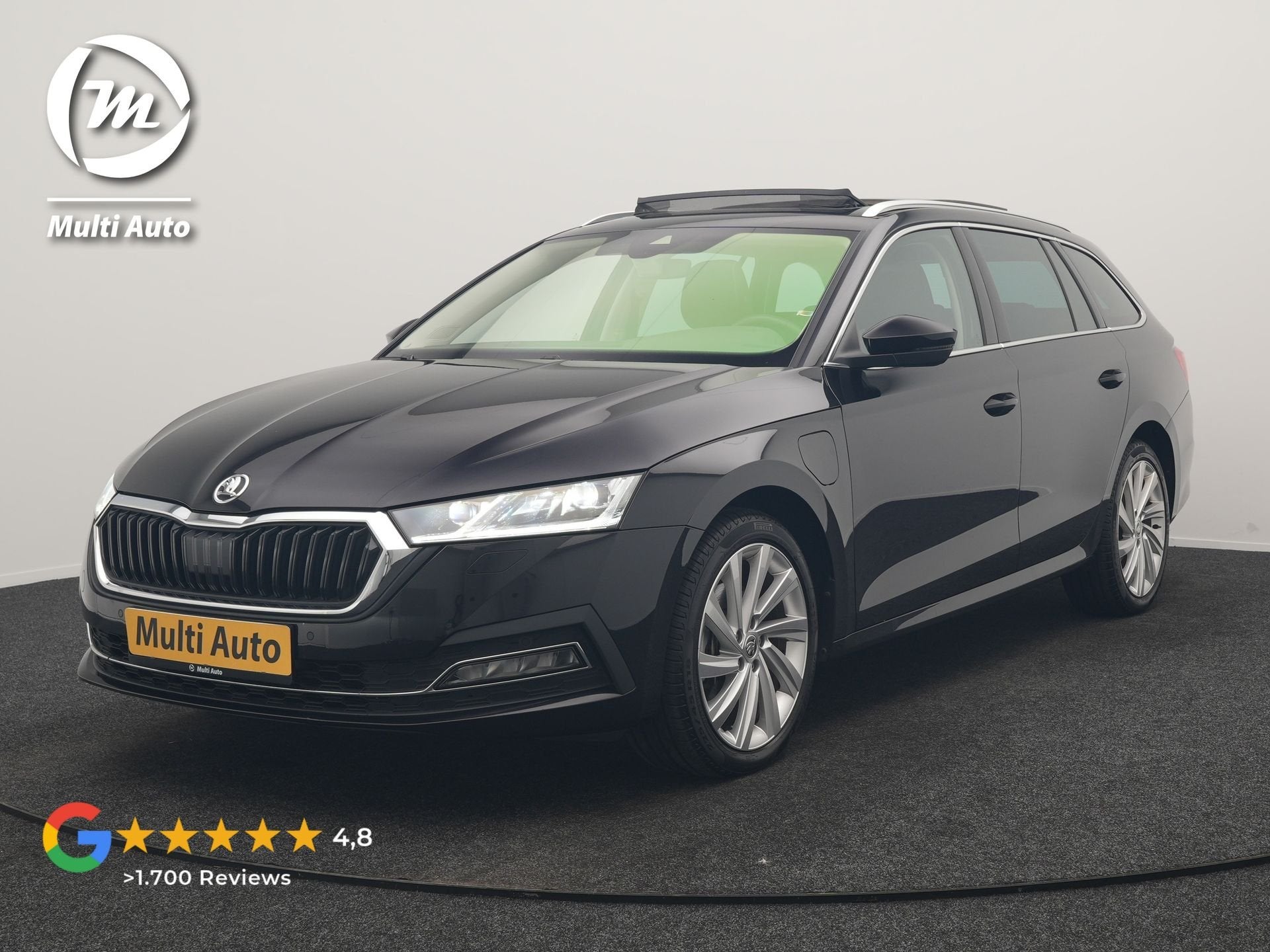 Skoda Octavia Combi 1.4 TSI iV PHEV Business Edition 204pk D, Auto's, Dealer onderhouden, Stof, Gebruikt, Zwart