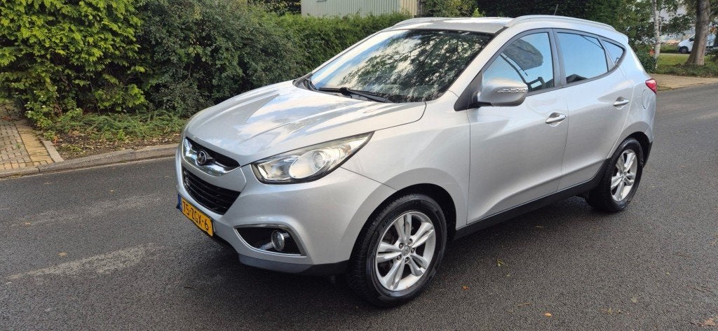 Hyundai IX35 2.0iBusiness Edition/automaat/leer/camera/trekh, Auto's, Gebruikt, Huisgarantie, 4 cilinders, Met garantie (alle)