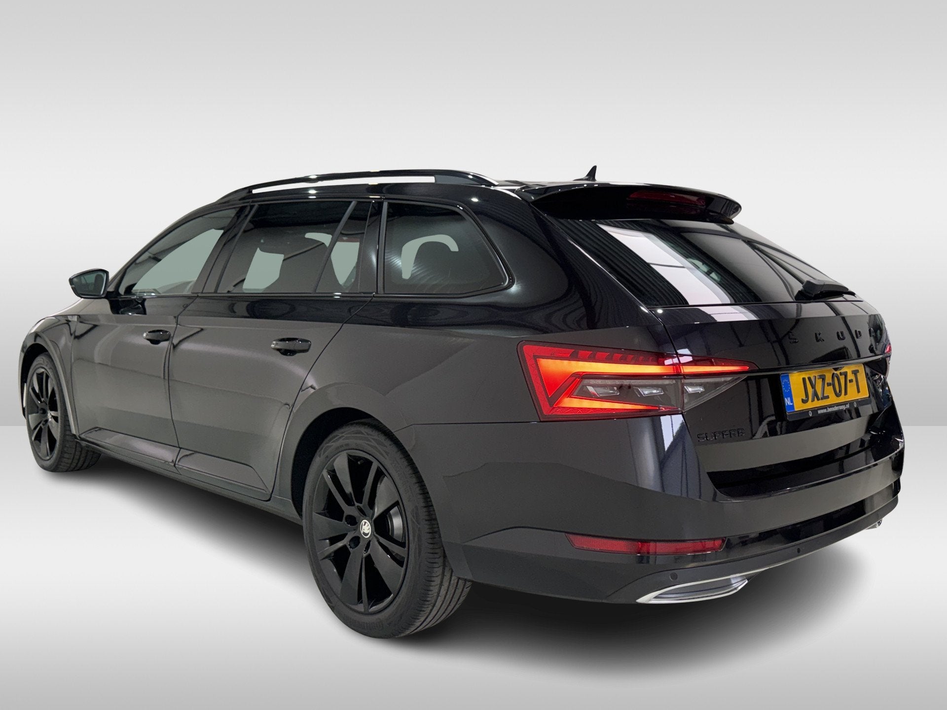 Skoda Superb Combi 1.4 TSI iV 218pk Sportline Business, Auto's, Skoda, Gebruikt, Euro 6, Zwart, Hybride Elektrisch/Benzine