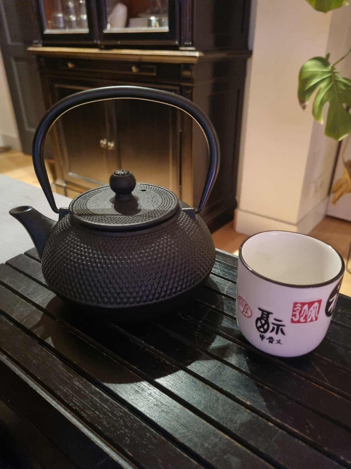 Gietijzeren chinese theepot, Ophalen