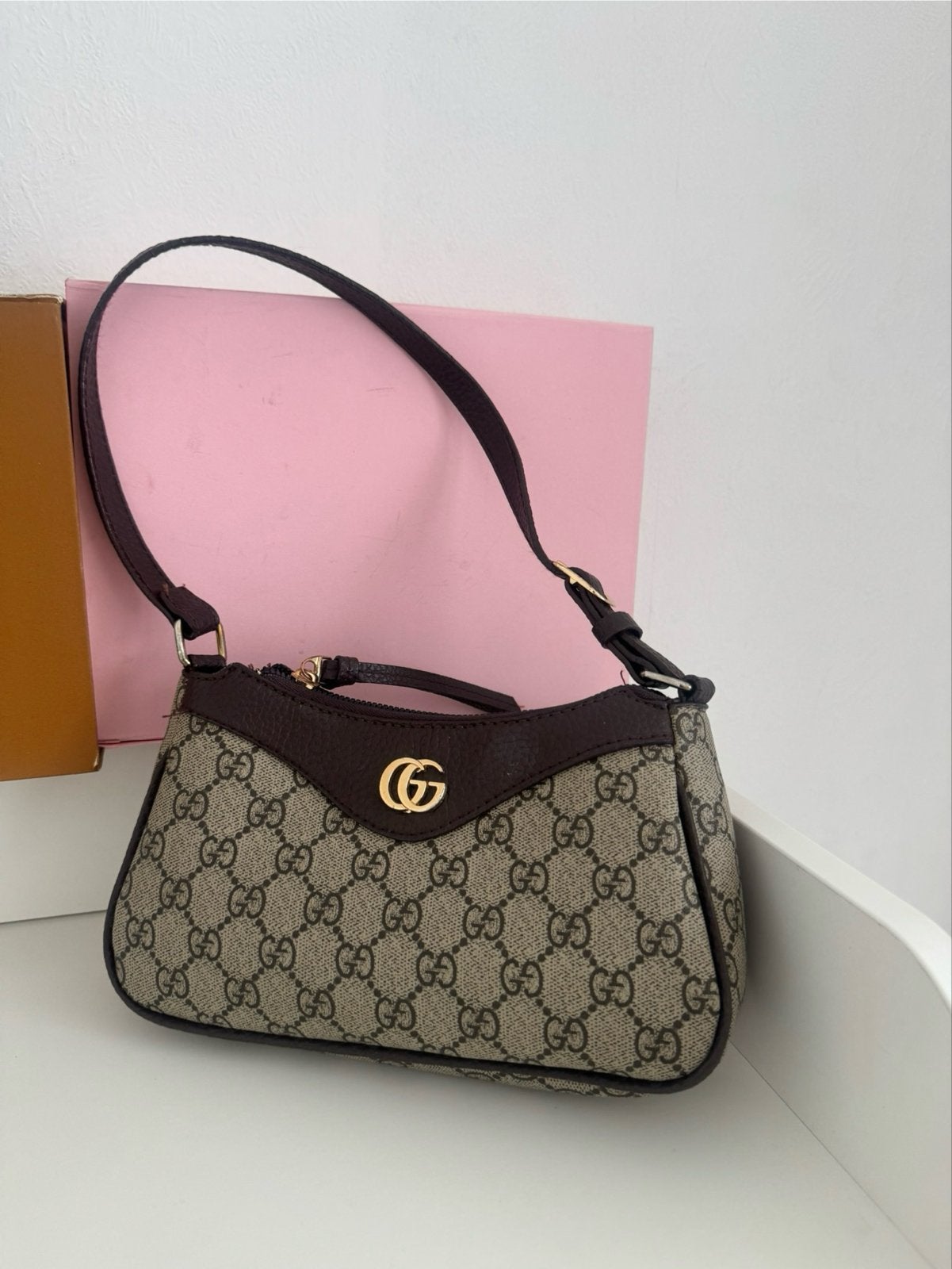 Gucci Schoudertasje met GG-patroon, Ophalen of Verzenden, Zo goed als nieuw, Bruin, Schoudertasje