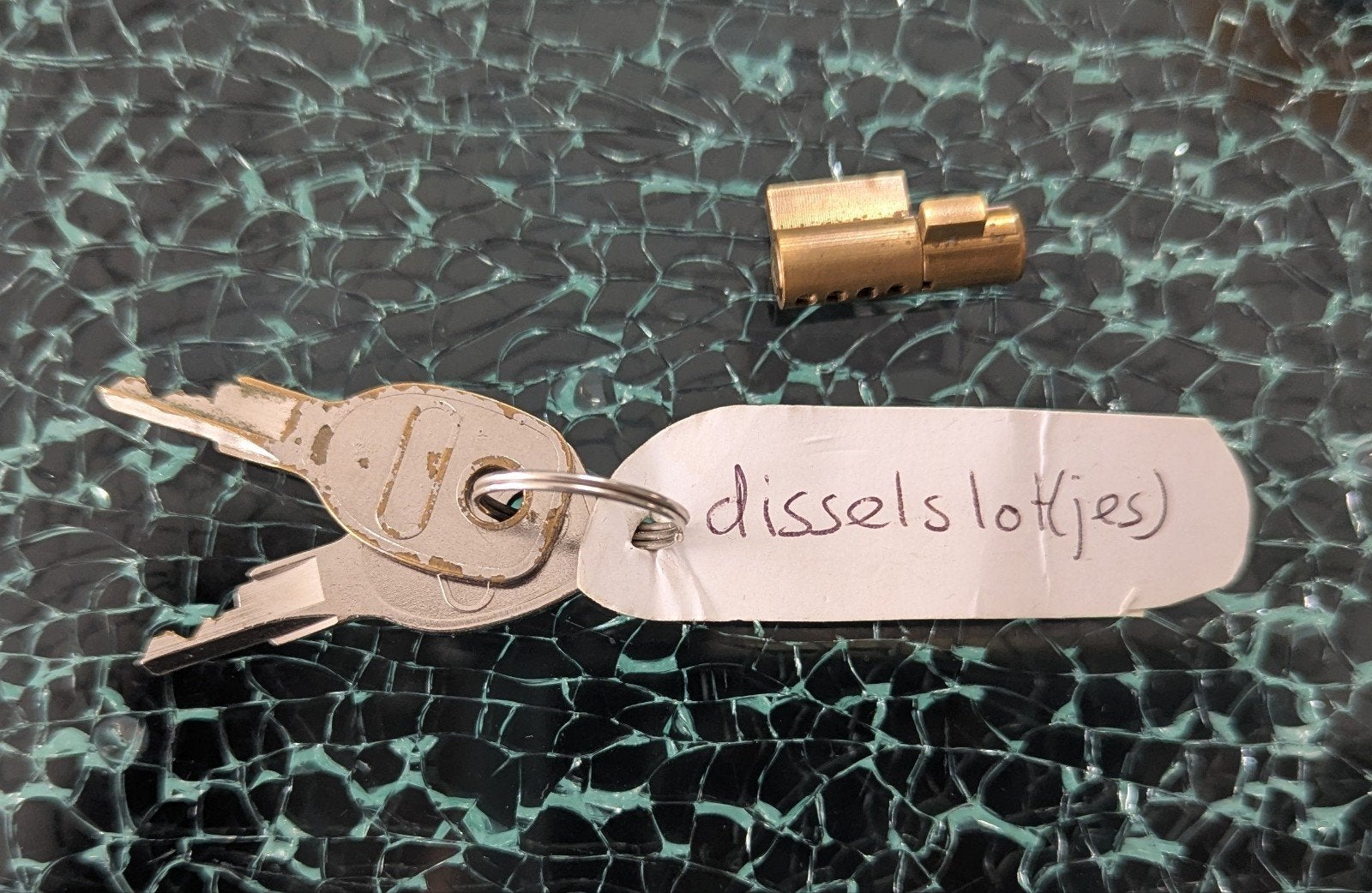 Disselslotje met 2 sleutels caravan aanhanger, Caravans en Kamperen, Ophalen
