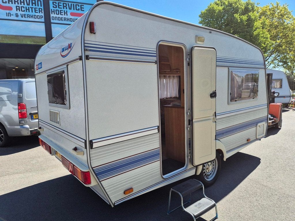 Wilk 400 DeLuxe 1 eig. Voortent + luifel MEGA rondzit of bed, WILK - TABBERT groep, Omvormer of Lader, Rondzit, Bedrijf
