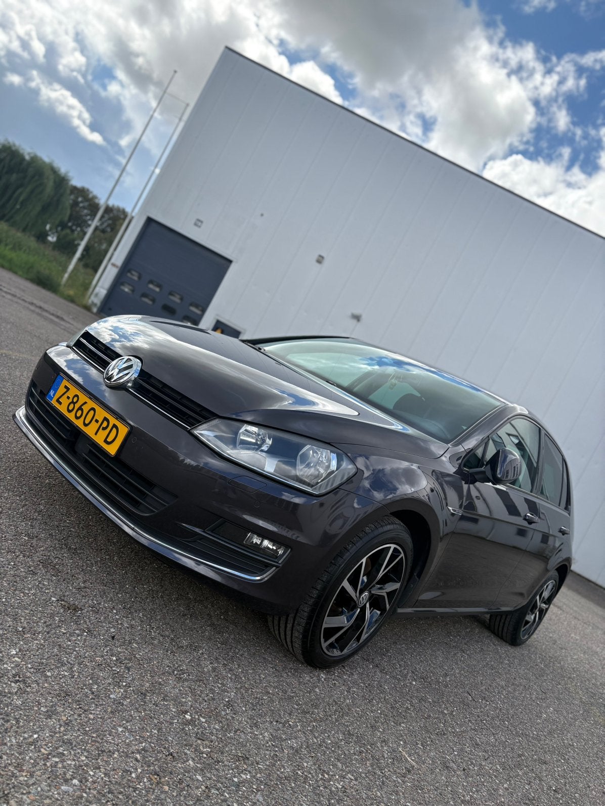 Volkswagen Golf 1.2 TSI 2016 Lounge metalic grijs | 140 Pk, Voorwielaandrijving, Dealer onderhouden, Stof, Zwart