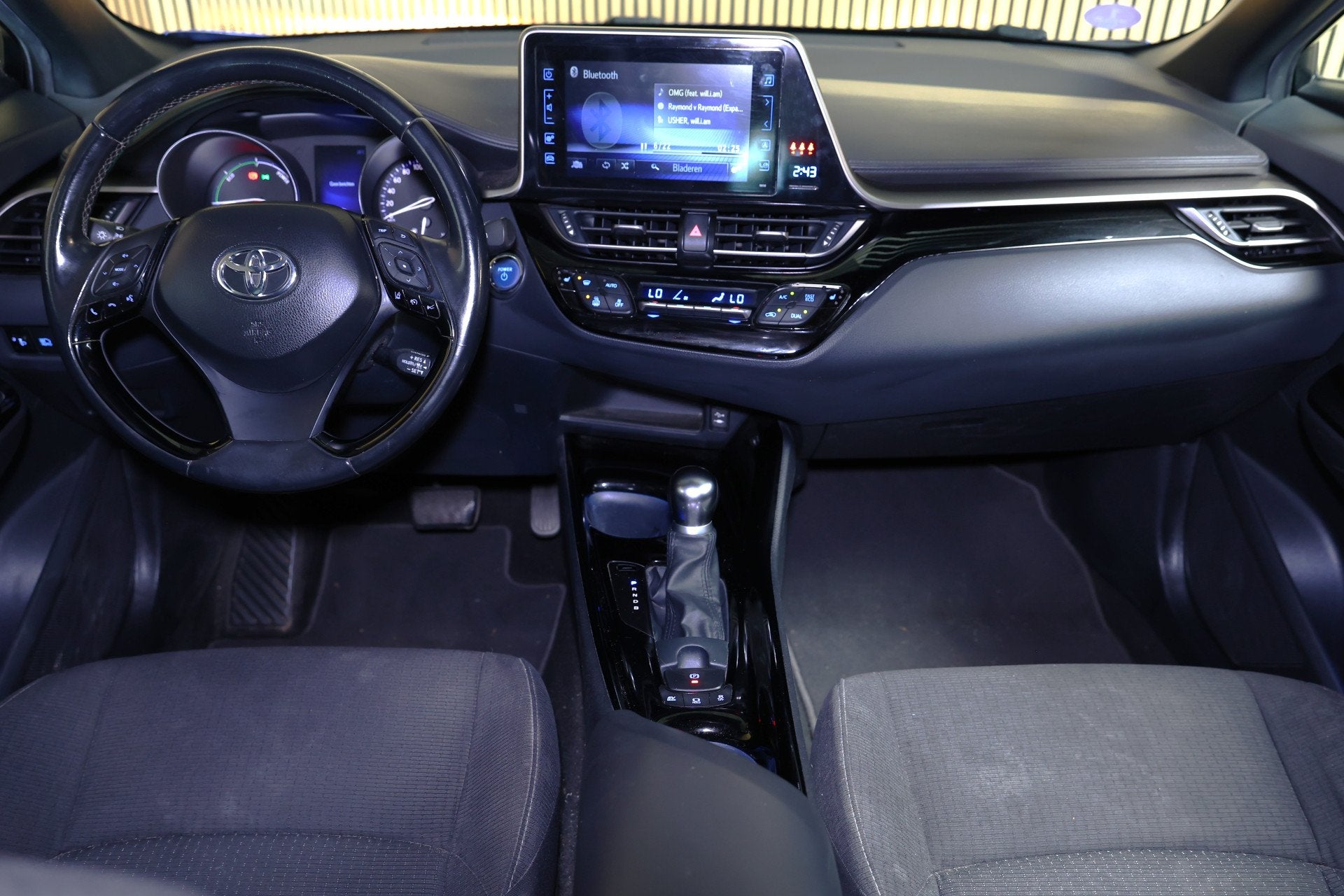 Toyota C-HR 1.8 Hybrid Business Ultimate NAVI CRUISE LANE CL, Auto's, Toyota, Euro 6, 4 cilinders, Blauw, Leder en Stof