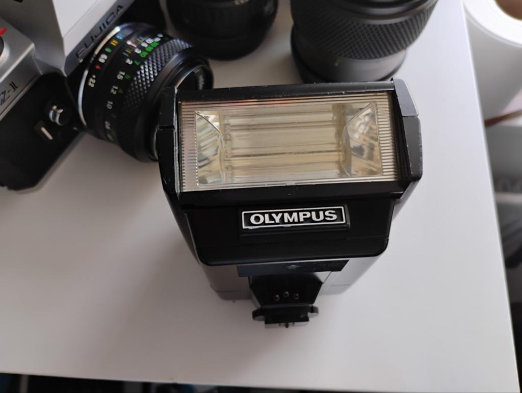 Olympus T32 flitser, Ophalen, Olympus