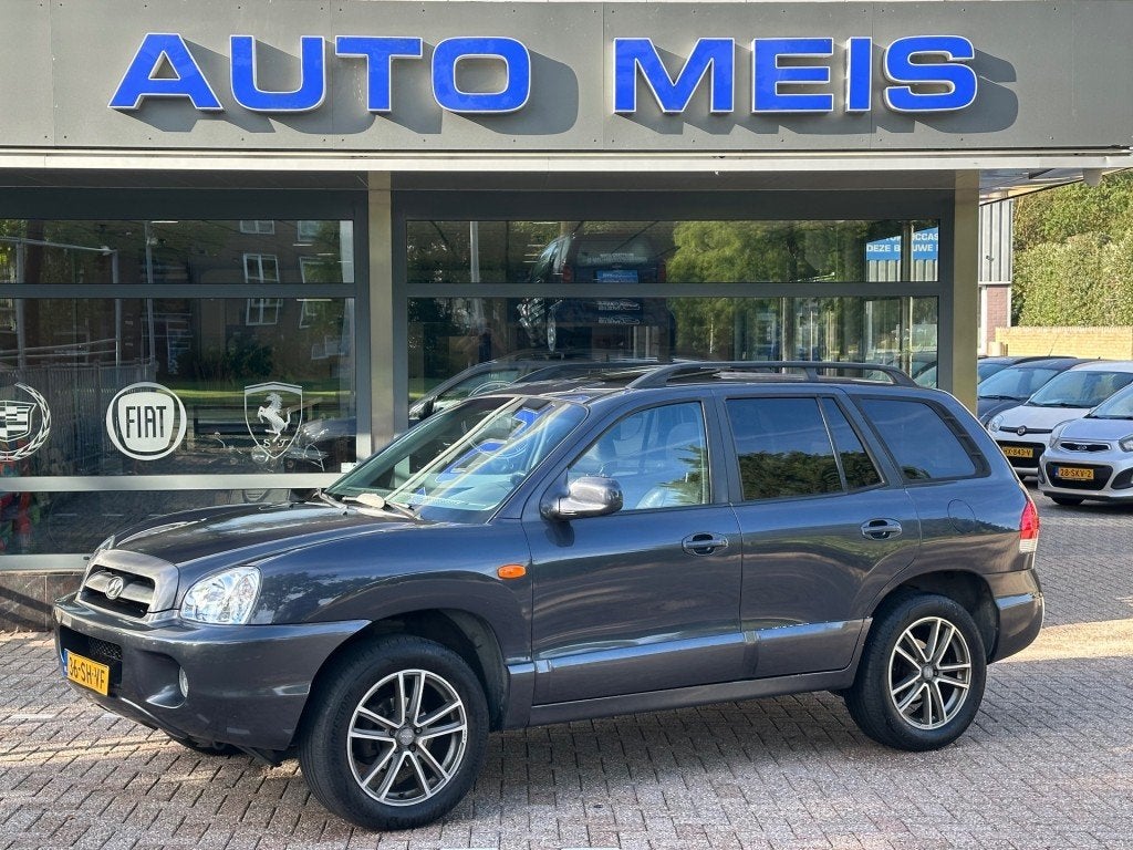 Hyundai SANTA FE 2.0i-16V Business Edition Leer Cruise Panor, Auto's, Voorwielaandrijving, Gebruikt, 4 cilinders, 2000 kg