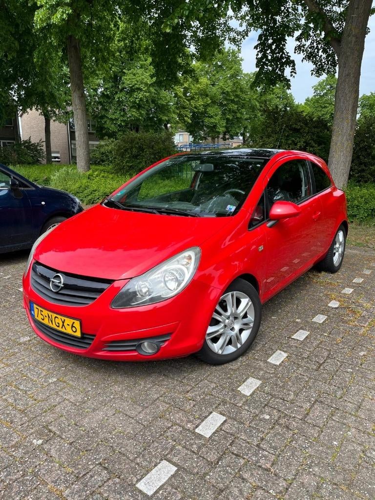 Opel Corsa 1.4 16V 3D 2010 Rood, Auto's, Voorwielaandrijving, 40 €/maand, 4 cilinders, Origineel Nederlands